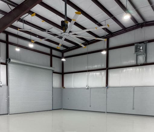 Inside a newly built industrial metal building